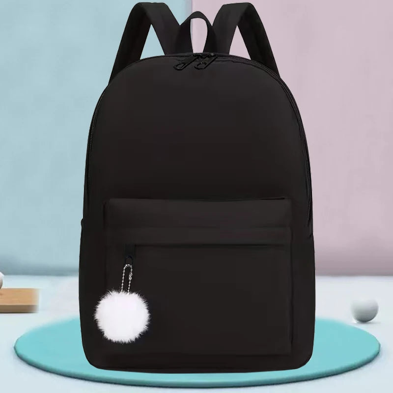 Elegant Casual Daypack, Solid Nylon Backpack with Adjustable Shoulder Strap and Pom Pom Charm for Women Daily Use All Occasions